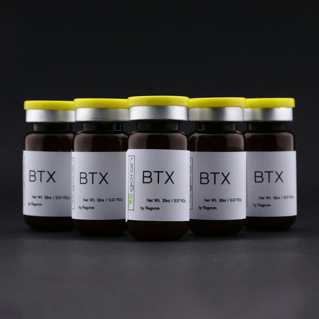 six jars of btx are lined up in a row